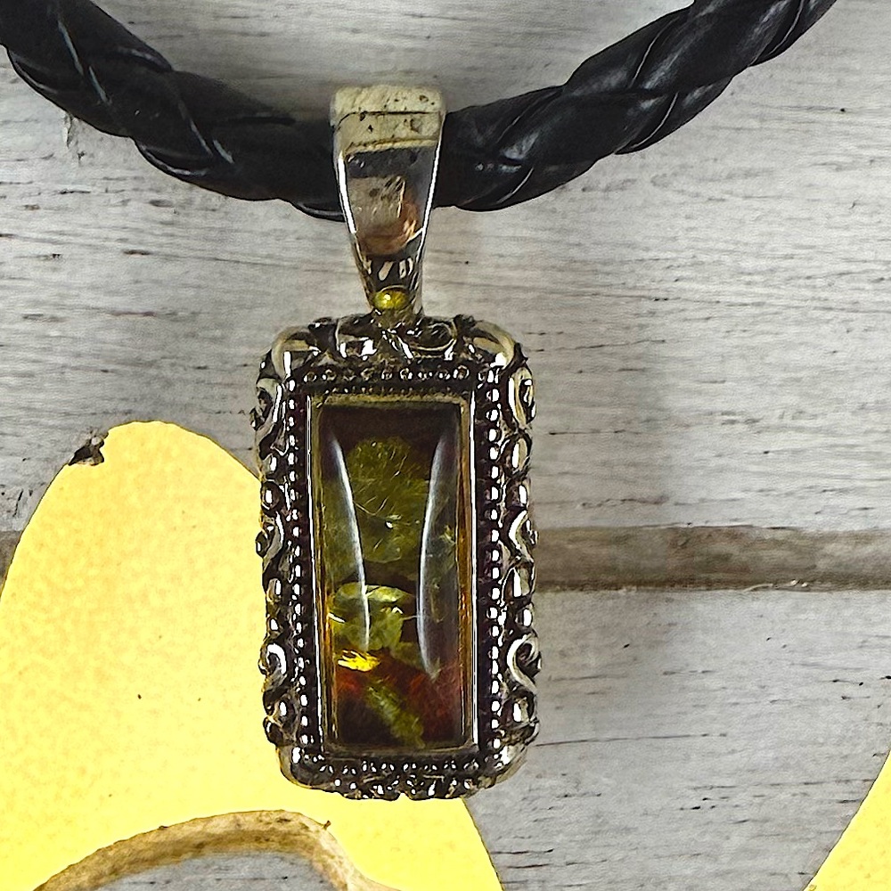 Amber and silver leather braided necklace. EUC.